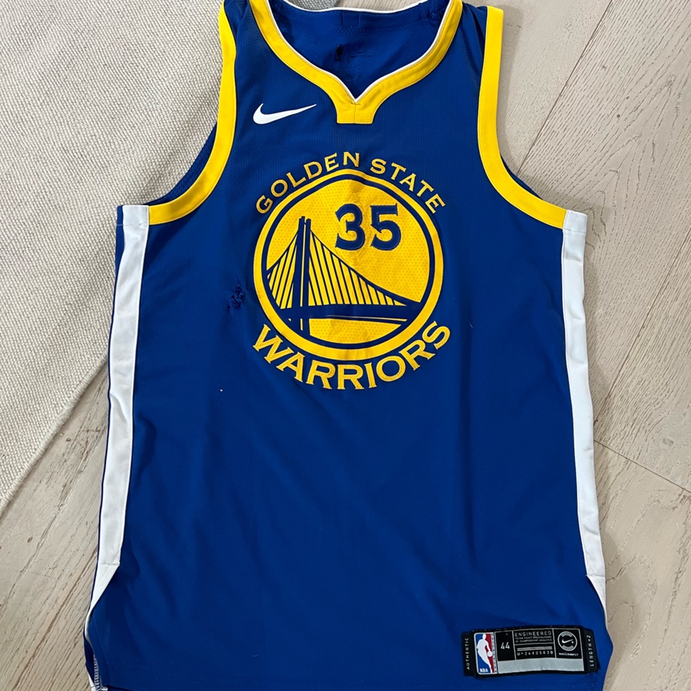 Nike jersey with dresser drawer snag/tear